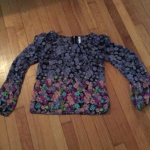 Sheer floral blouse.